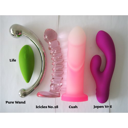 Cush next to other toys